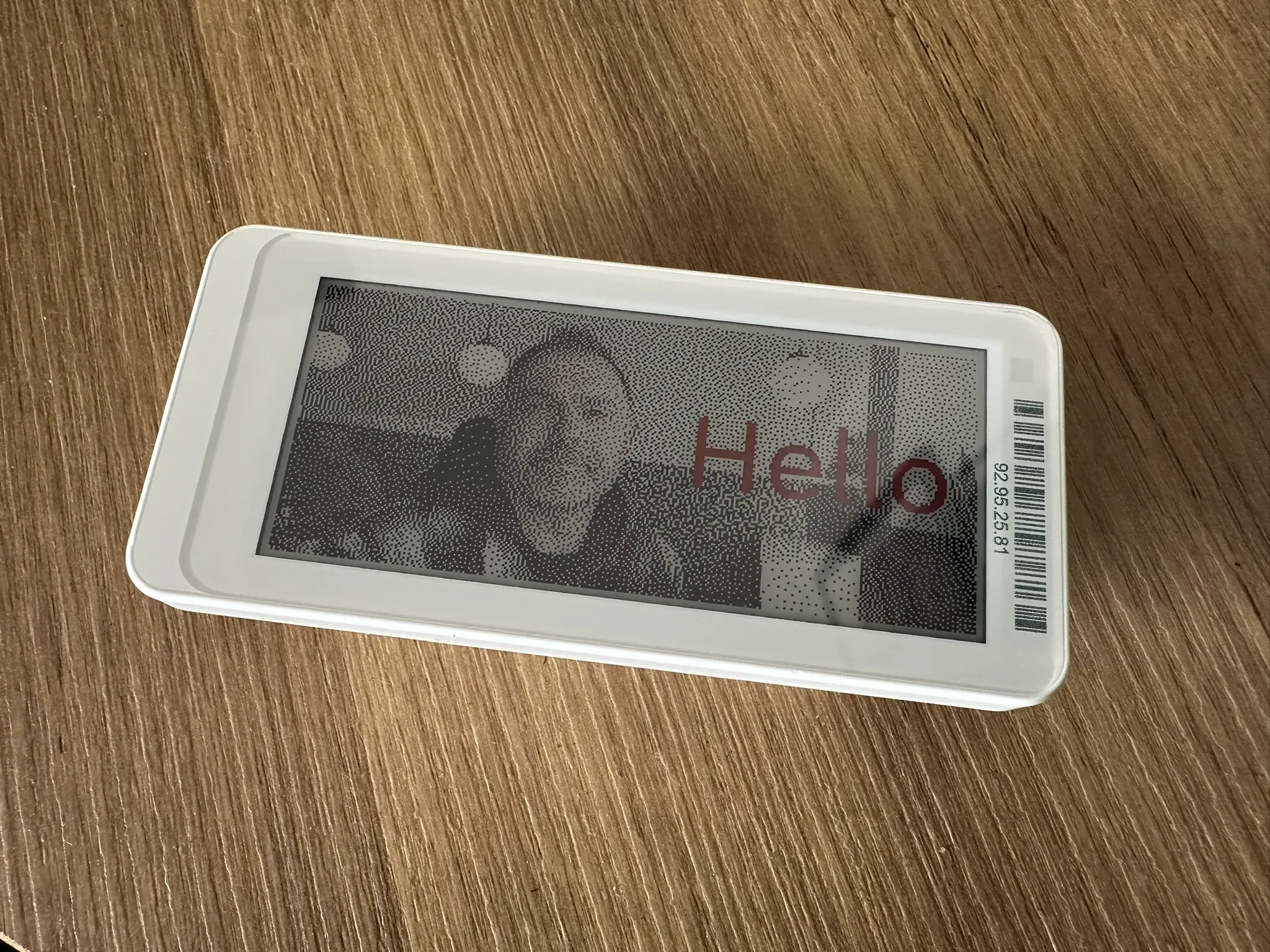 An Electronic Shelf Label displaying a picture of me and the word Hello.